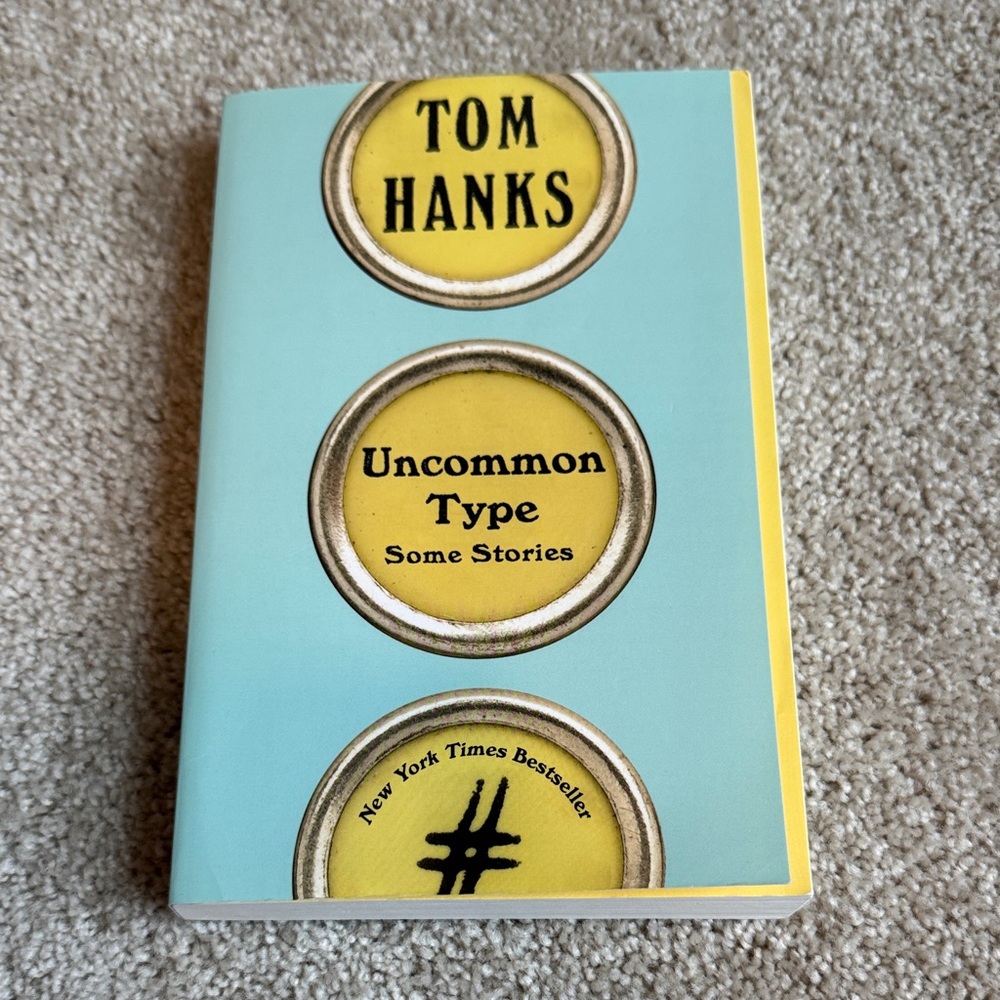 Tom Hanks "Uncommon Type" Paperback Book - Yellow & Light Blue